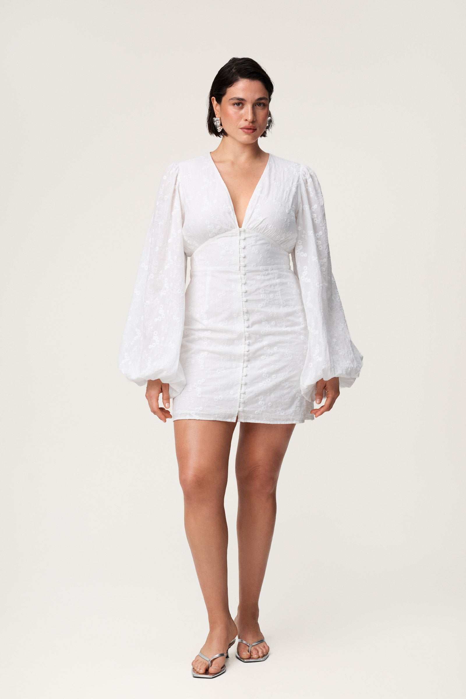 Mini dress in white embroidery Shop now adoore.com Mini dress in white embroidery Shop now adoore.com