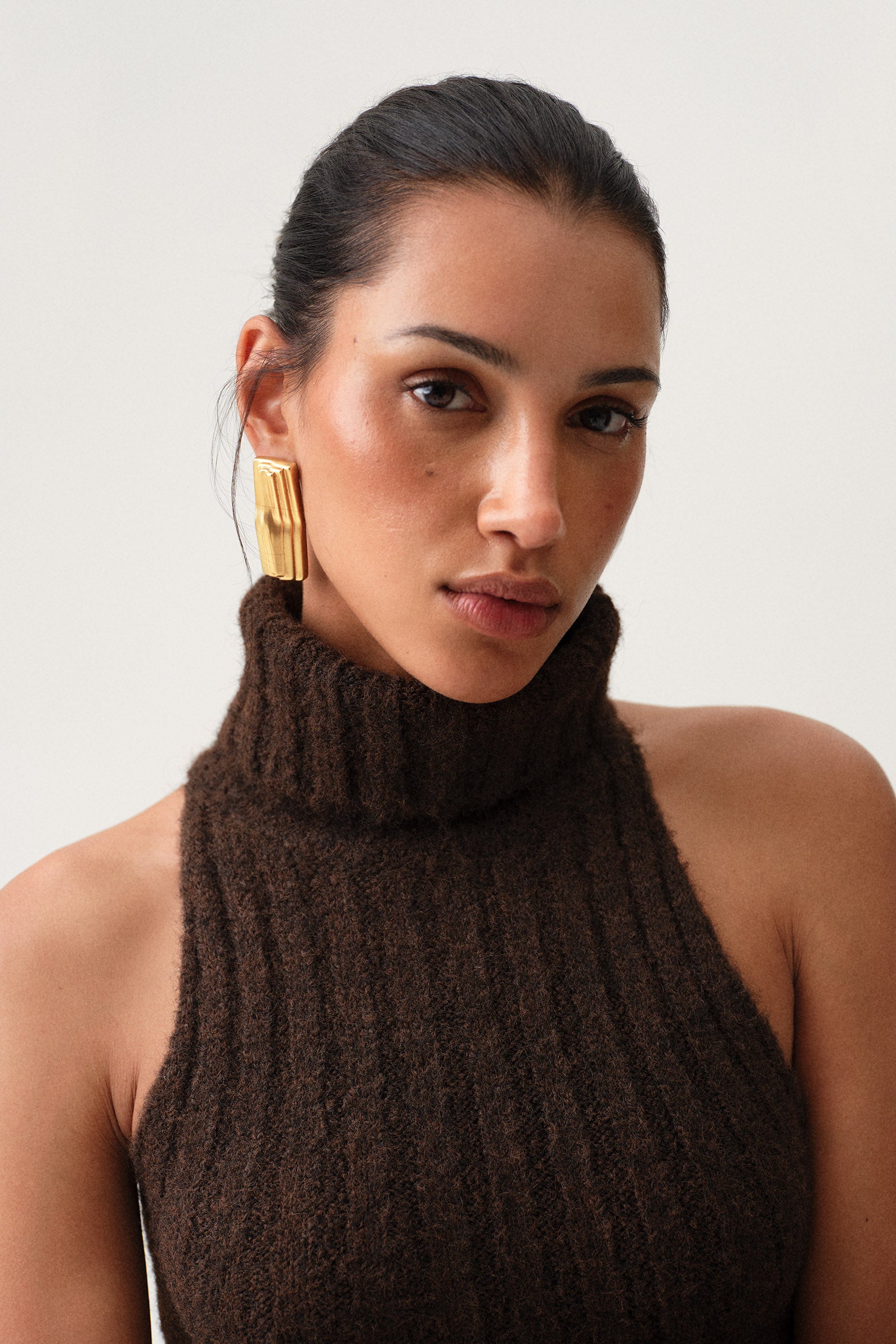 Adoore sophisticated gold earring, timeless statement.  image