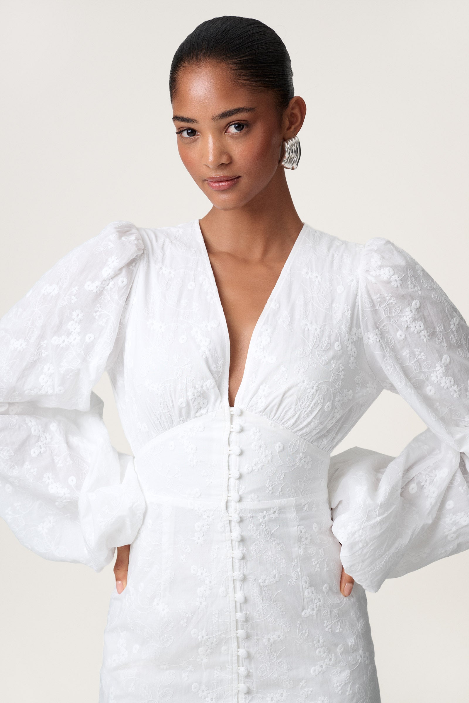 Mini dress in white embroidery Shop now adoore.com Mini dress in white embroidery Shop now adoore.com