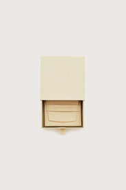 Beige jewelry box with 'ADOORE' branding on a white background thumbnail image