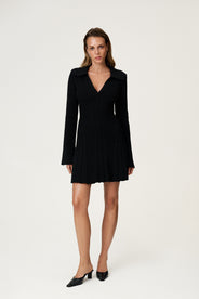 Black knitted dress in mini length and long sleeves. thumbnail image