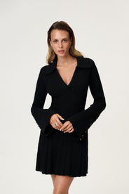 Black knitted dress in mini length and long sleeves. thumbnail image