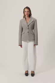 brown tweed blazer with buttons in the front and padded shoulders, fitted waist and long arms thumbnail image