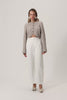 Cropped knitted Cessole cardigan in greige with button closure.